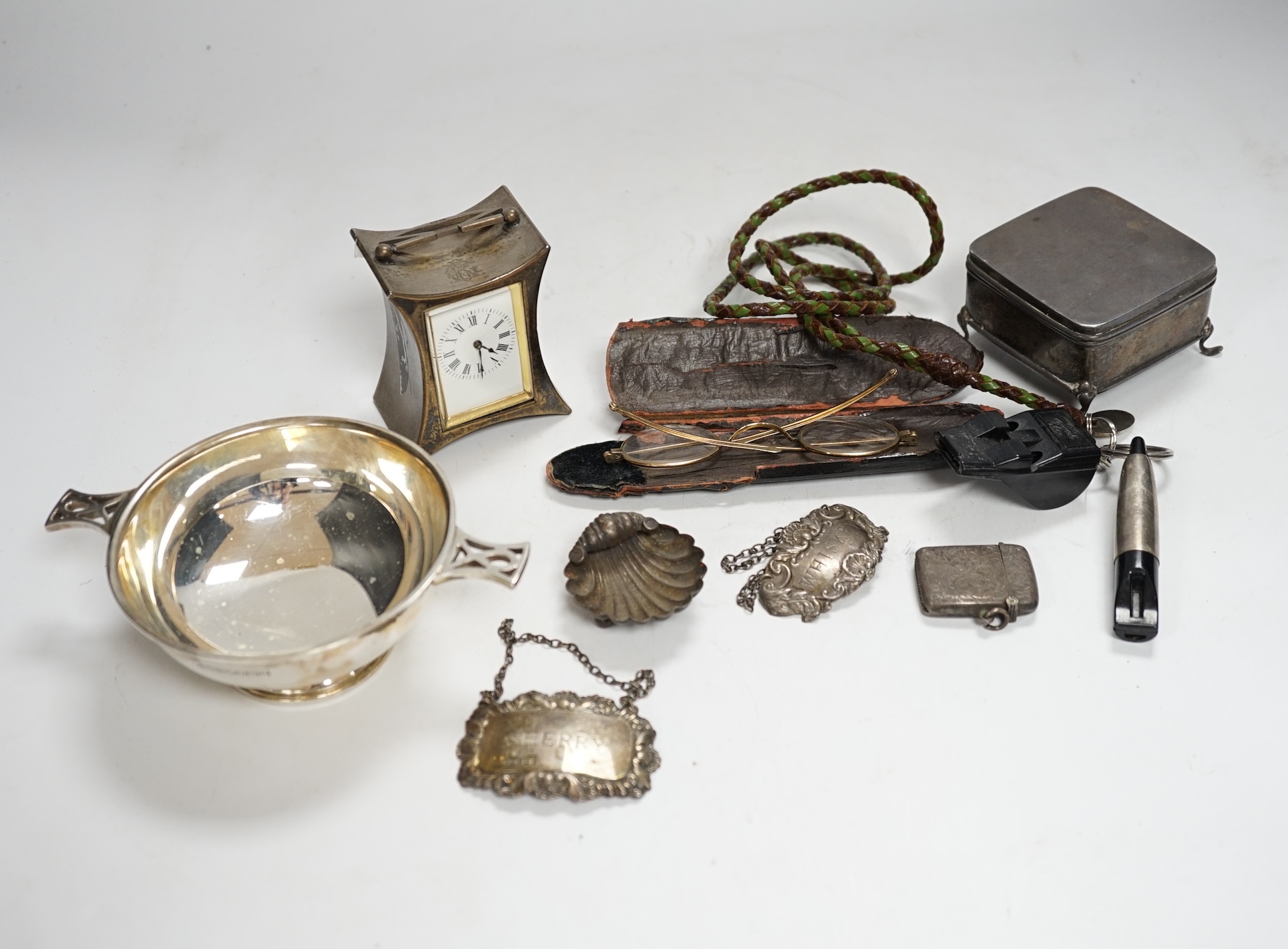 A group of small silver including a late Victorian carriage timepiece with later movement?, trinket box, quaich, vesta case, salt etc.